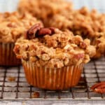 4 sweet potato muffins placed on a wire rack.