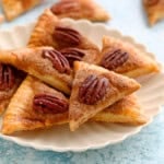 pie crust cookies in a white plate.