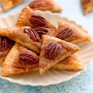 pie crust cookies in a white plate.