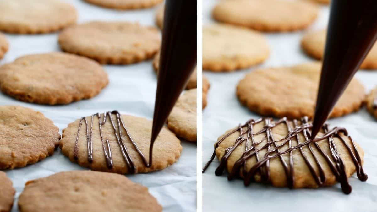 walnut cookies in a white baking sheet.