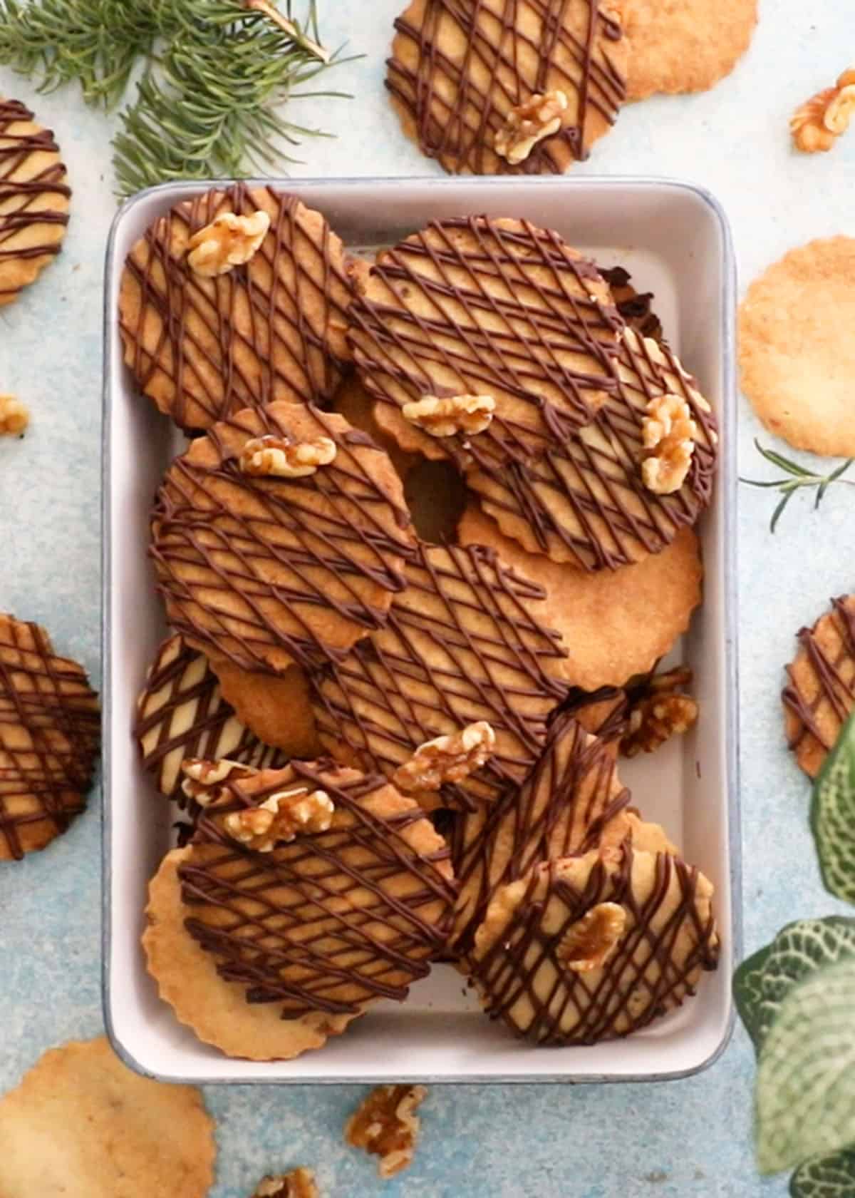 walnut cookies in a white tray.