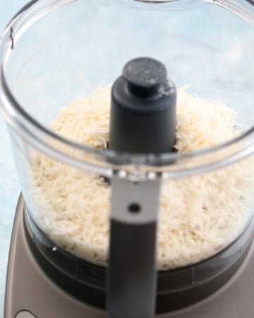 white shredded coconut in a food processor.
