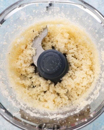 white shredded coconut in a food processor.