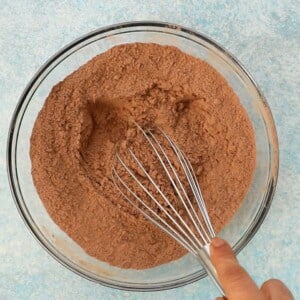 brown flour in a glass bowl.