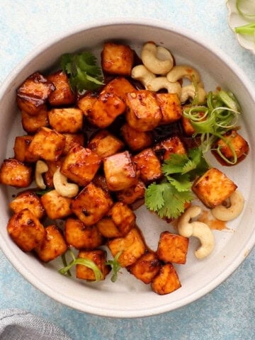 air fried firecracker tofu in a white bowl.