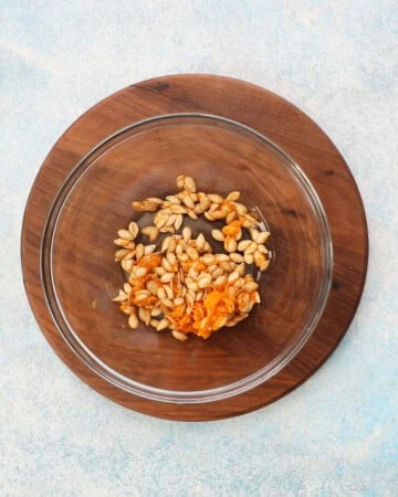 butternut squash seeds in a glass bowl.