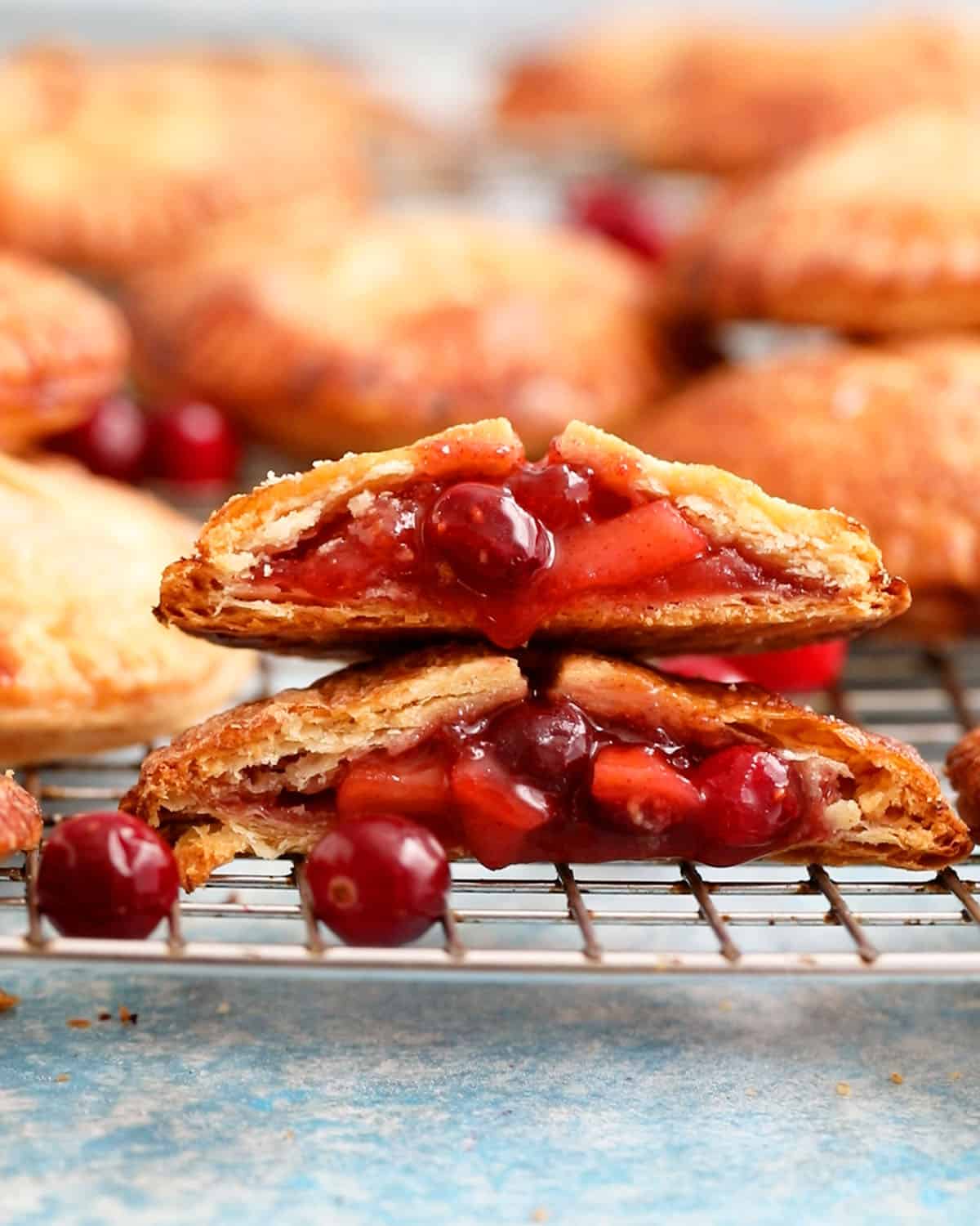 apple cranberry hand pies on a wire rack. 
