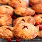 apple cranberry hand pies on a wire rack.