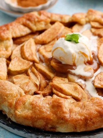 apple galette topped with white ice cream.