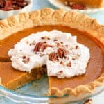 butternut squash pie in a glass pie dish.