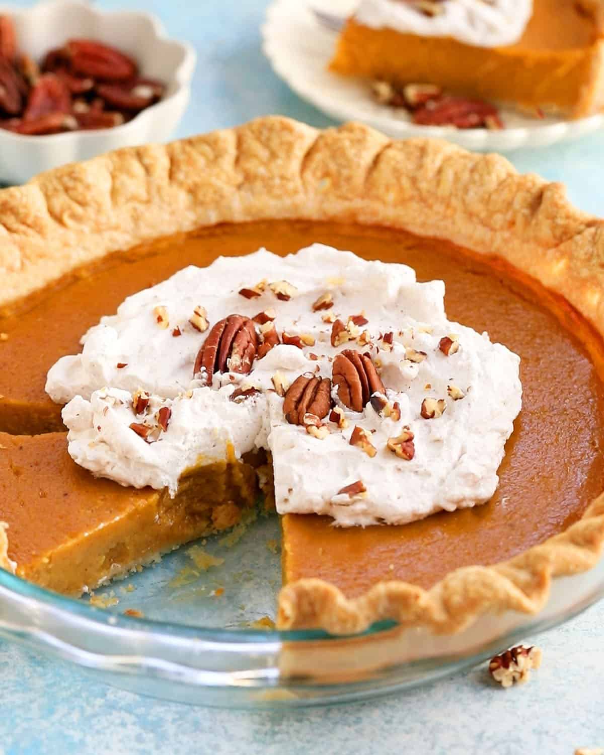 butternut squash pie in a glass pie dish.