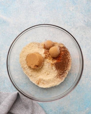 almond flour, brown sugar and spices in a glass bowl.
