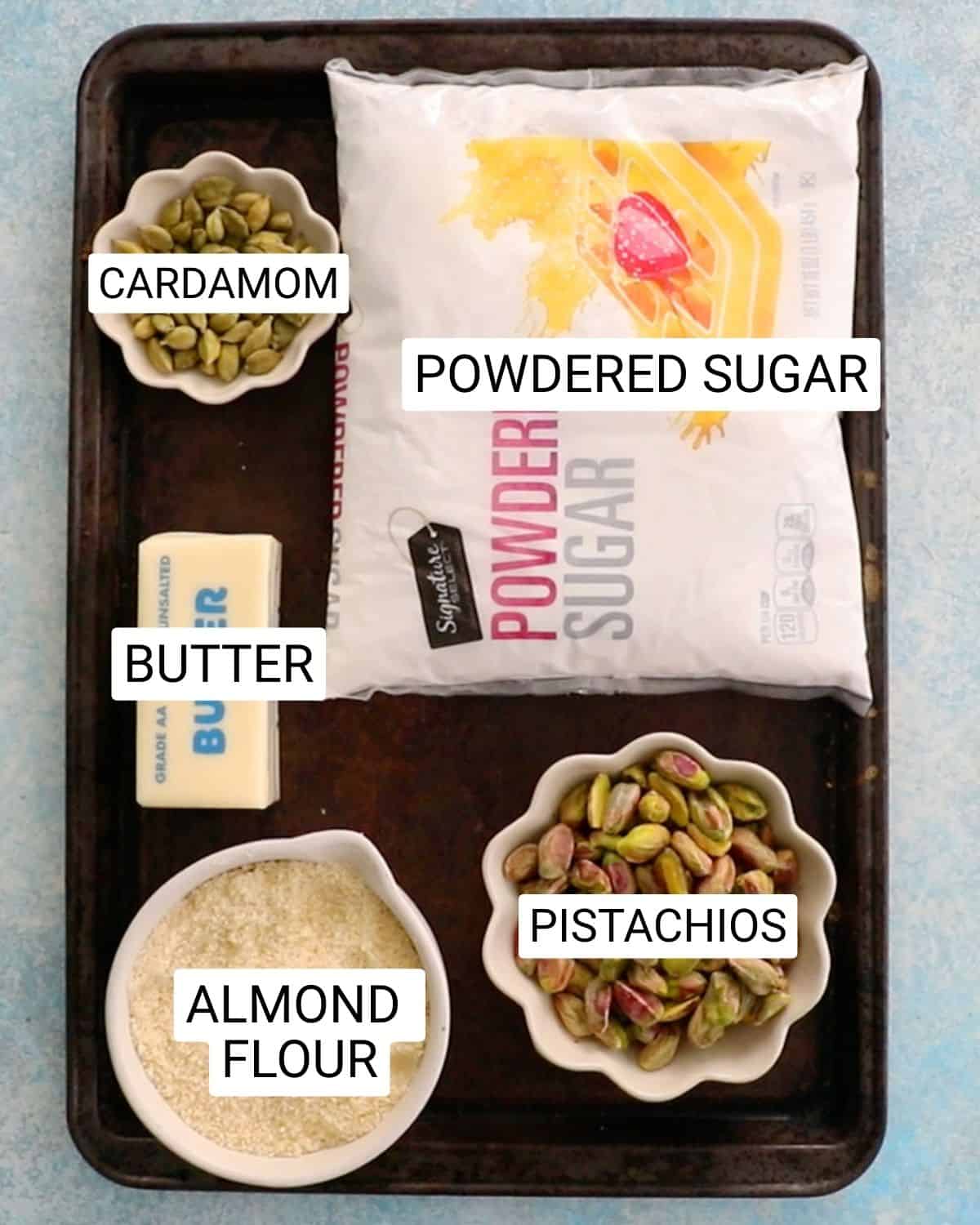 ingredeints needed to make almond flour pistachio snowball cookies.