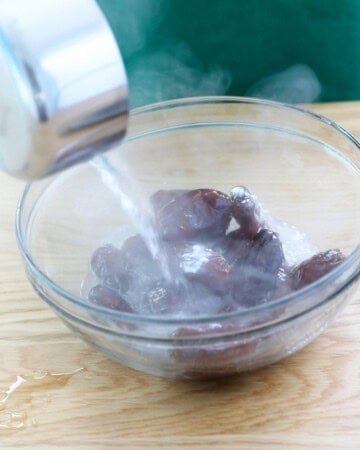 brown dates in a glass bowl.