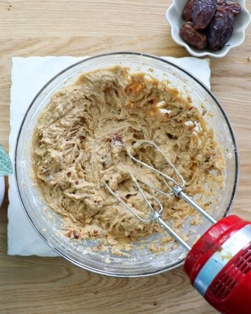 date cake pudding batter in a glass bowl.