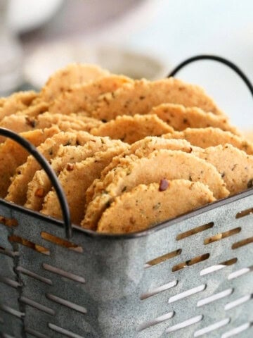 almond flour crackers in a metal pan.