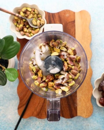 green pistachios in a food processor.