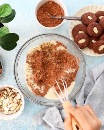 almond flour chocolate cookie ingredients in a glass bowl.