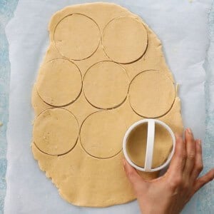 white cookie dough on a white paper.